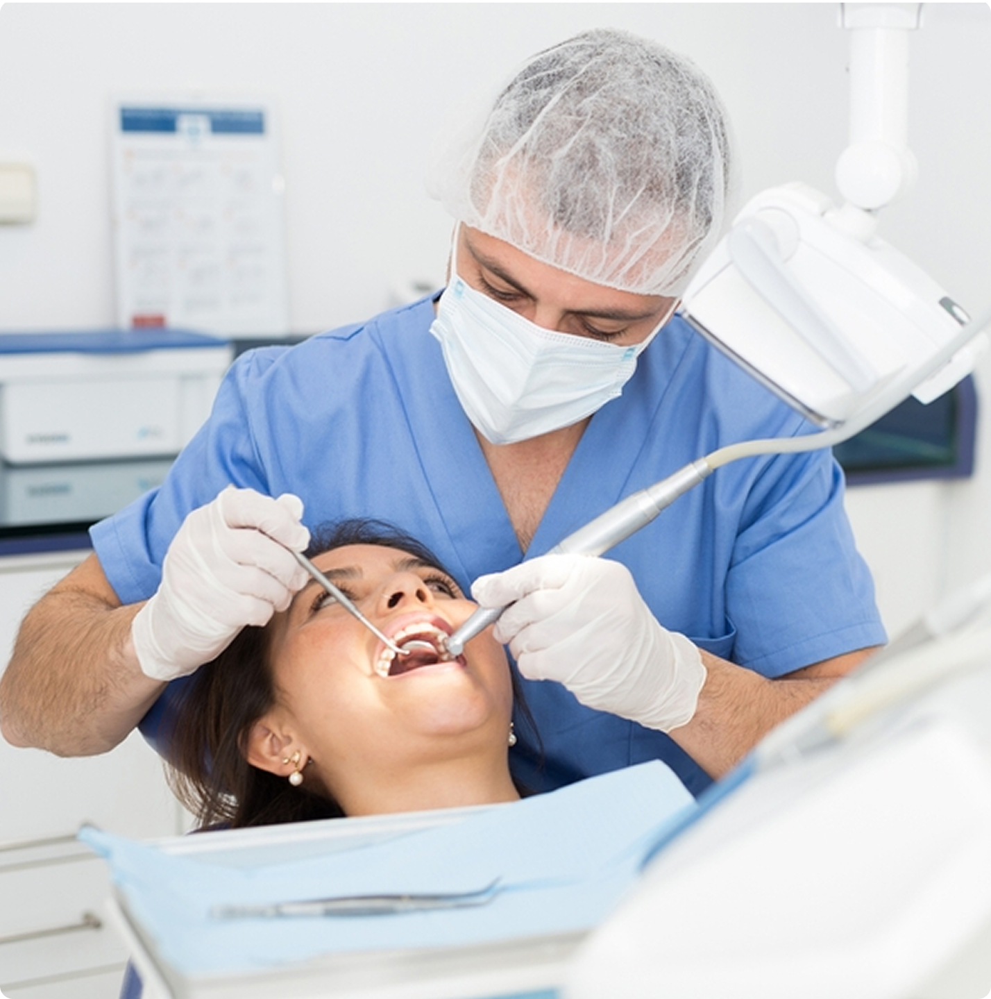 Dental Clinic - Doctor treating patient